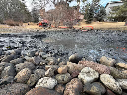 Pond Dredging Season in Colorado: How Hydro Excavation Restores Depth Without Draining Your Pond